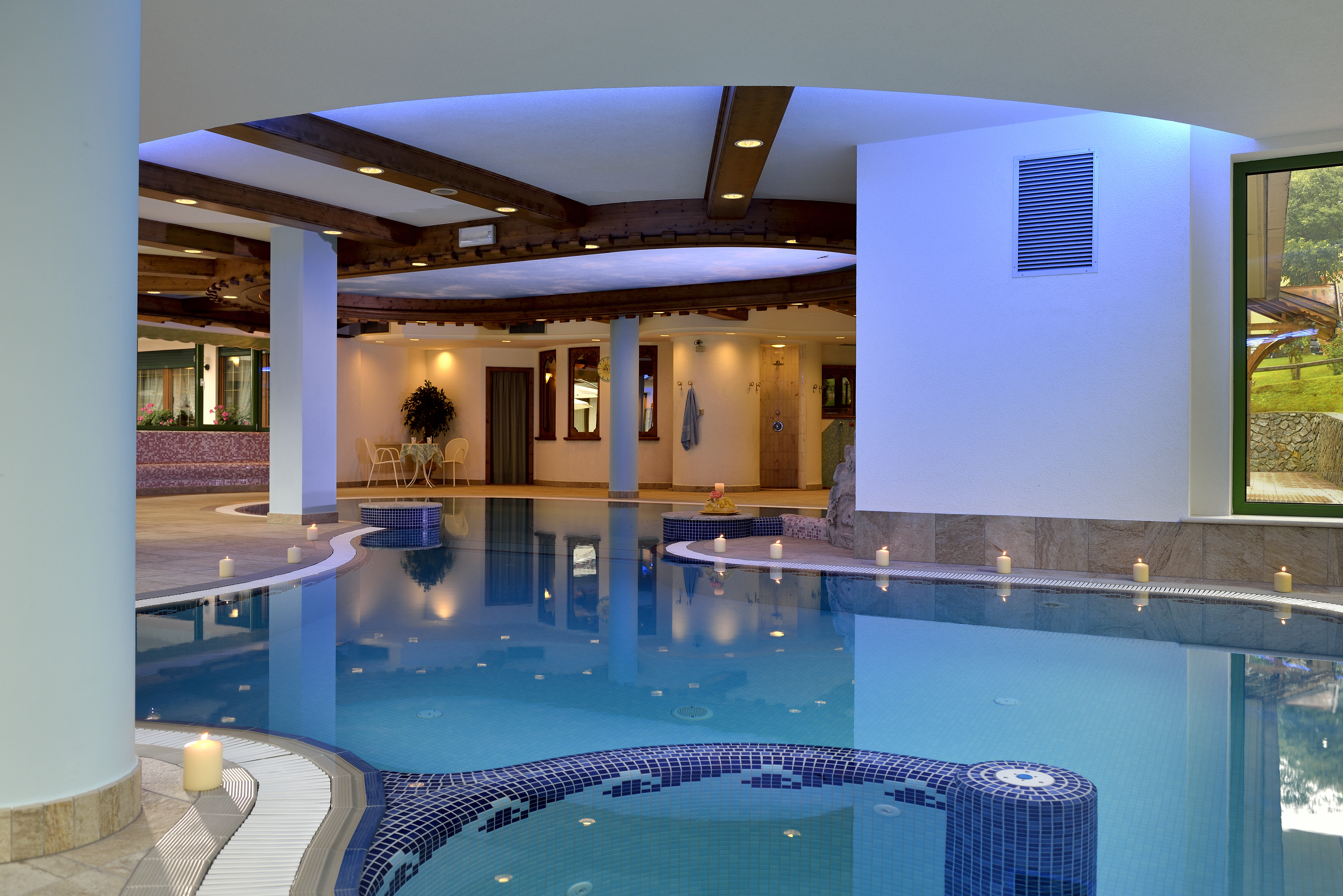 La piscina del BW Premier Collection Tevini Dolomites Charming Hotel